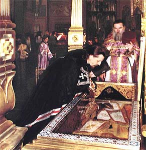 Archbishop Ioann near the shrine with the hallows of St. Joseph